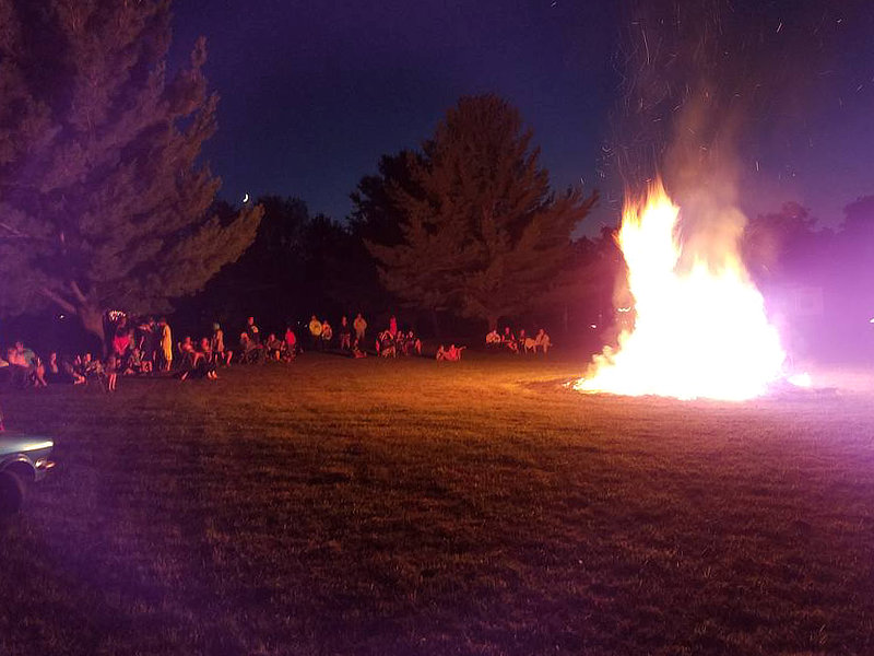 Bonfire in field at night