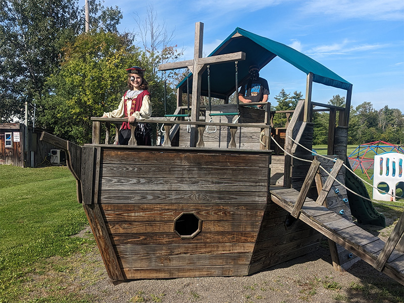 Playground pirate ship at Hide-A-Way Campsites